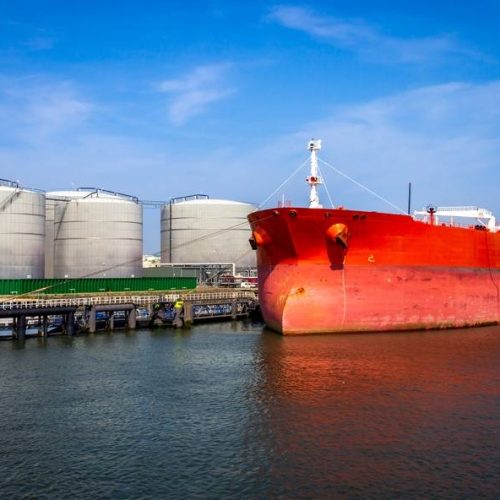 Crude,Oil,Tanker,Docked,At,A,Oil,Storage,Silo,Terminal Crude,Oil,Tanker,Docked,At,A,Oil,Storage,Silo,Terminal